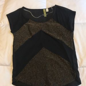 Small, black boutique short sleeve top.